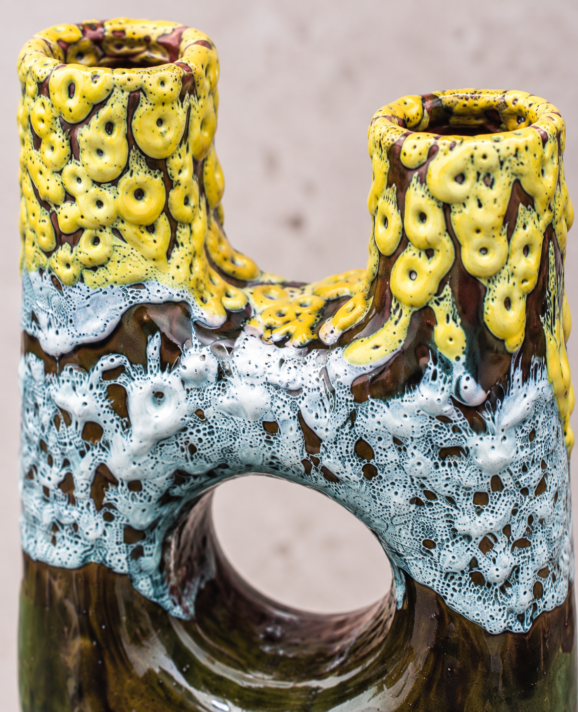 Atlas sculptural vase, side view of the double neck and open centre